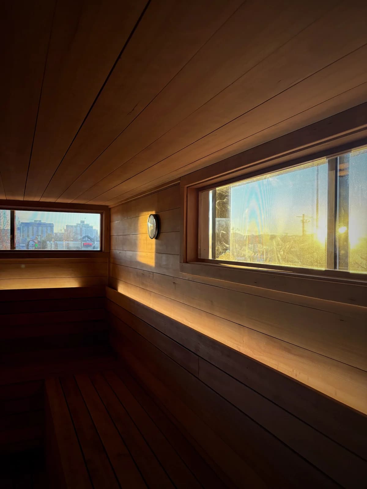 Golden light through the sauna window at Rejuuv-n